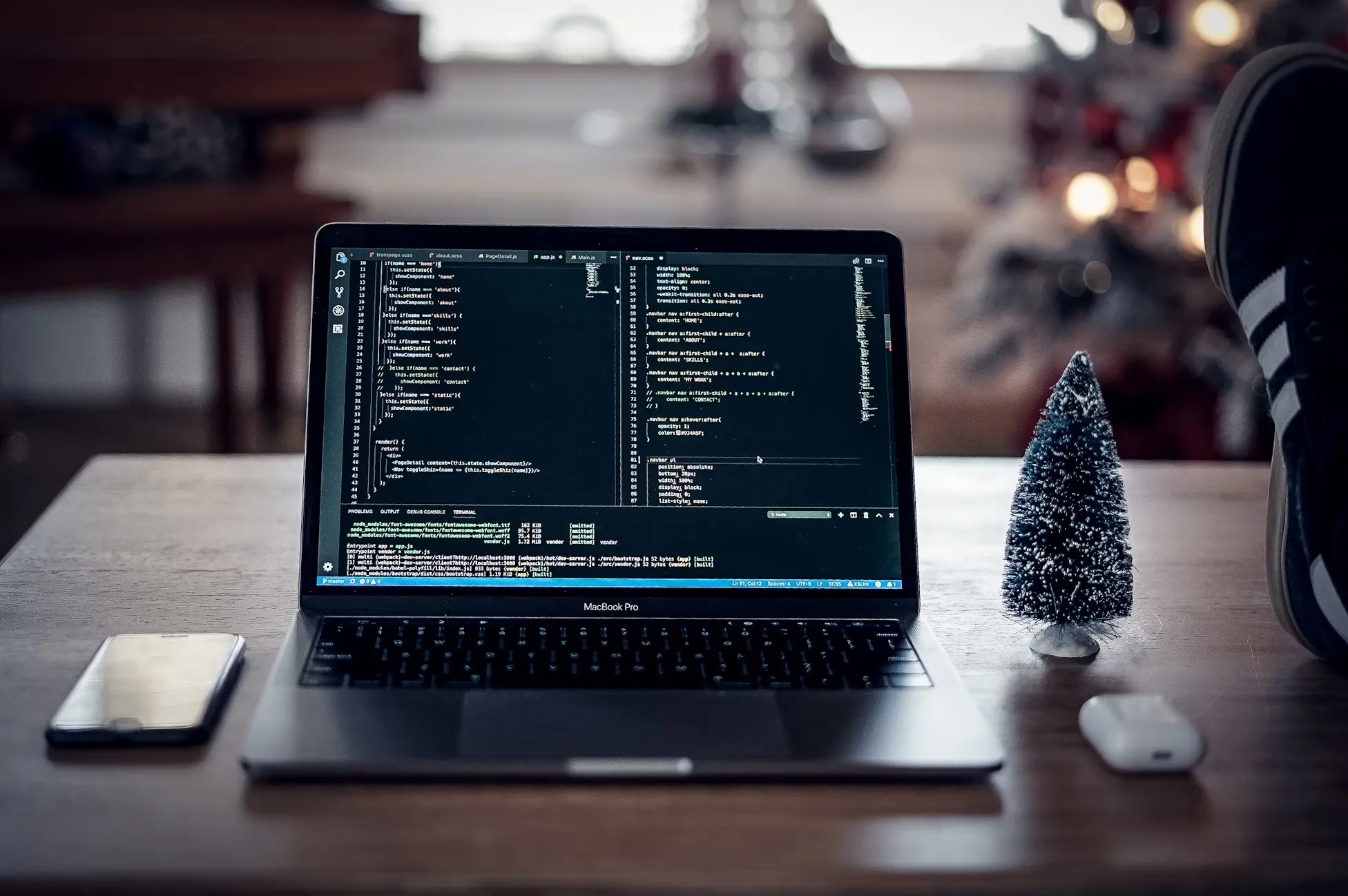 Stock image of a laptop and code
